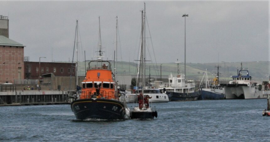 All Weather Lifeboat with yacht in tow