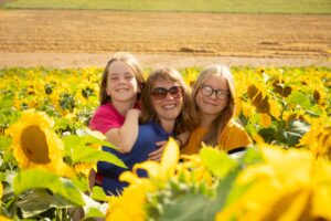 Hazel &amp; Girls in the Sunflower Trail.<br /> Photo credit Seven Spring Photography.
