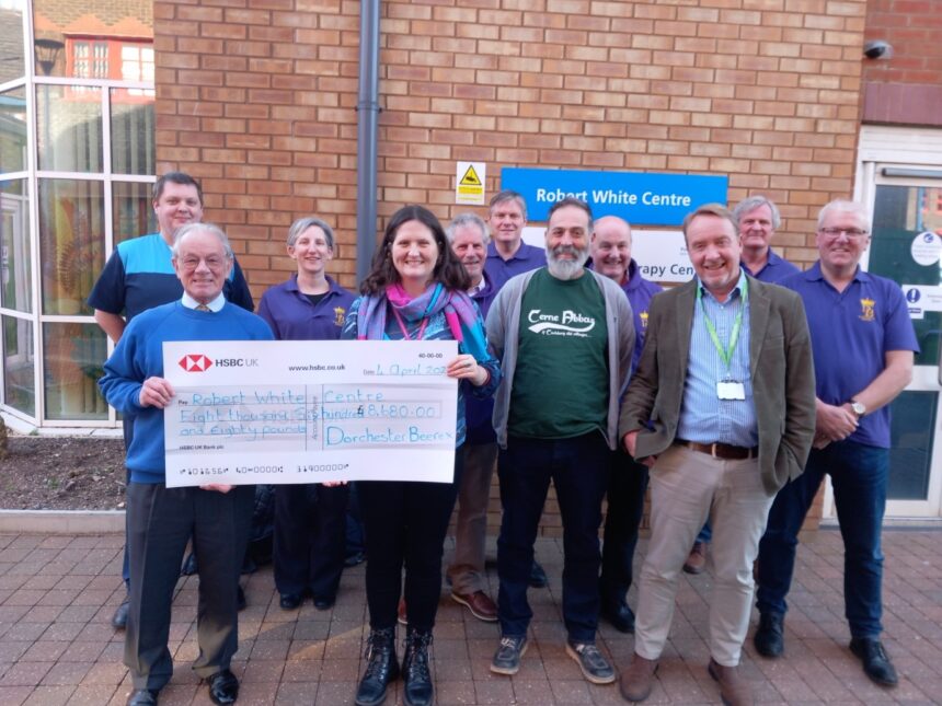 Chris Davies of Dorchester Casterbridge Rotary Club along with West Dorset CAMRA Beerex Committee members present a cheque to Victoria Hunt from the Robert White Centre for £8,680.00 with Cerne Abbas brewery Director Vic Irvine and Dorset County Hospital head of Charity Simon Pearson. Photo credit Rich Gabe.