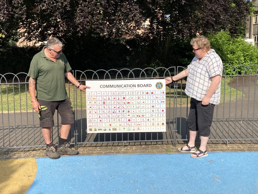 Fiona Kent Ledger, Chairman of Dorchester Town Council’s Management Committee and Iain Adshead, Head Gardener, inspect the first of two Communication Boards to be located in Dorchester. Photo: Carl Dallison, Dorchester Town Council