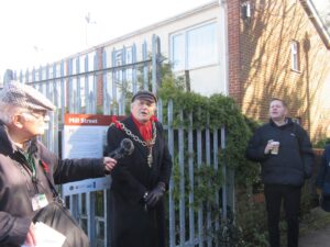 The Mayor at the Mill St board, with Mark Chutter preparing to lead the walking tour