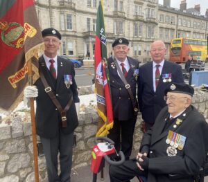 Weymouth Anzac Day. The gentleman using the mobility scooter is Reg Fox, a 97 year old veteran of the Korean war who is interviewed in the recording