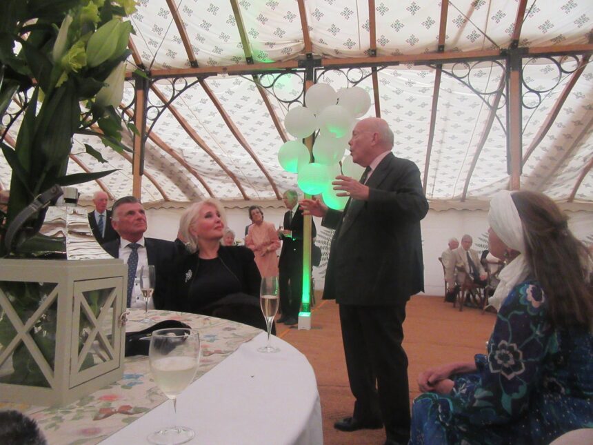 Society’s retiring President, Lord Julian Fellowes, addresses the gathering in the marquee