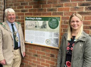 Mayor of Dorchester, Cllr Robin Potter (left) and Kirsty Schmidt of Stay Original unveiling the heritage information panel