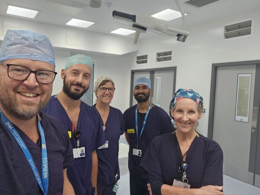 Staff in the new theatre