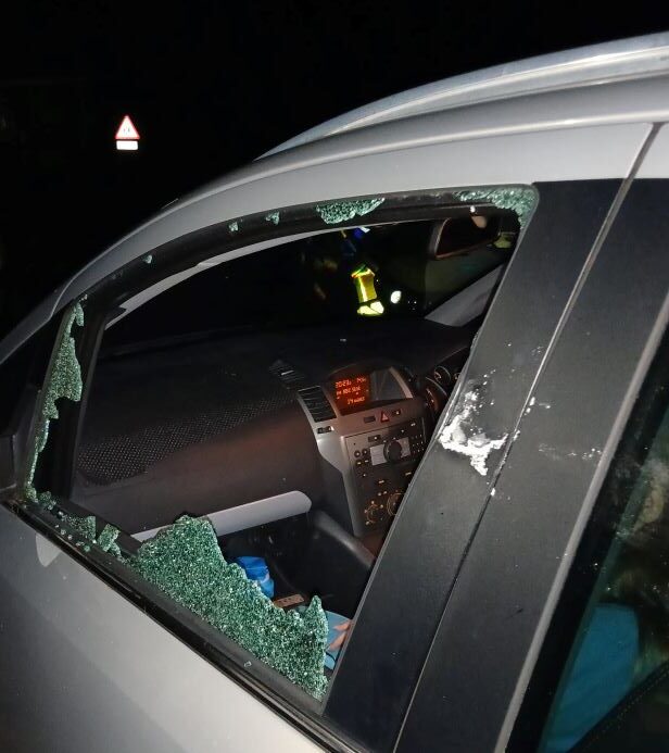 Moving vehicles damaged in Piddlehinton by rock thrown from bushes
