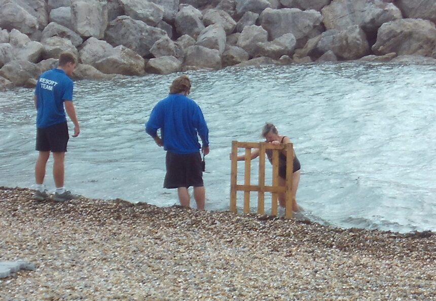 Potentially hazardous wooden pallet retrieved from sea off Preston Beach