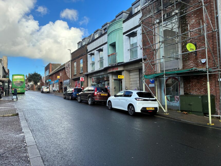 Post Office parking showing bus stops opposite