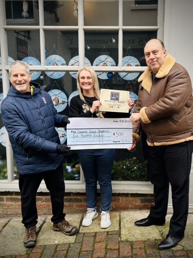 Presentation of the award to Tyra Goosen from Creative Image Studios