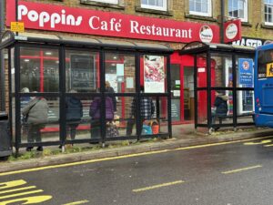 Weed and grass growth in Trinity Street, the town's main bus stop