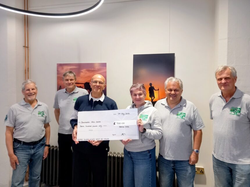 Artistic Director of Dorchester Arts Centre receiving £700 from the Beerex Committee.