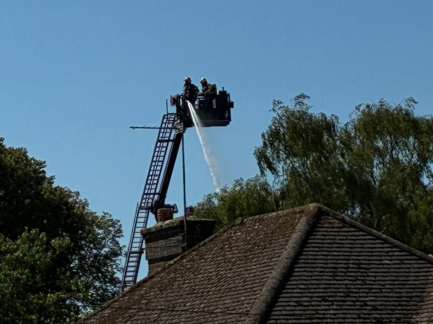 Aerial high ladder in use at the Queen’s Avenue, Dorchester fire.