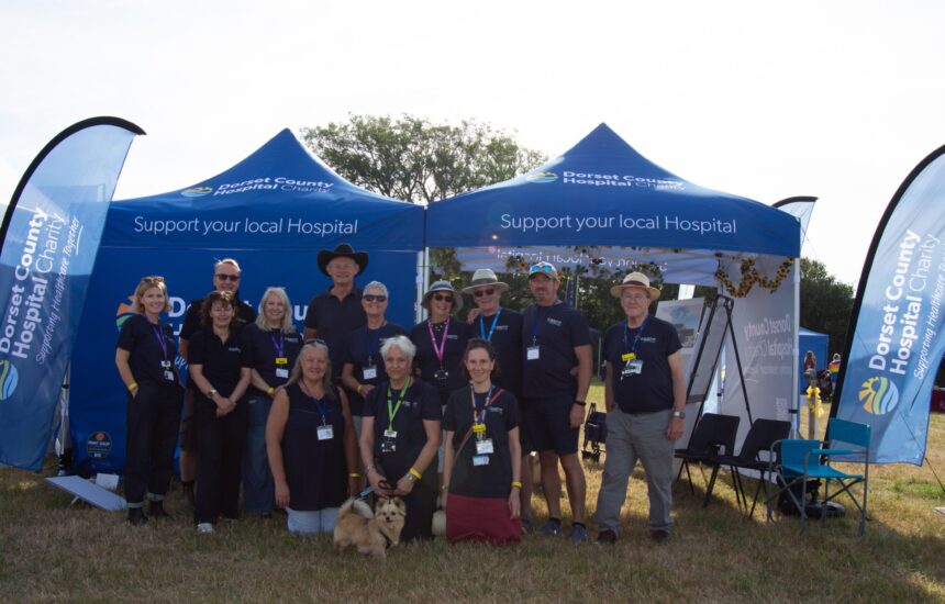 The DCH Charity team and volunteers with Martin Clunes at Buckham Fair © Faye Neal Photography
