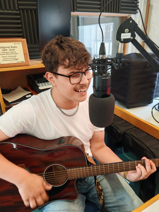 Local musician William Frampton performs live in the studio